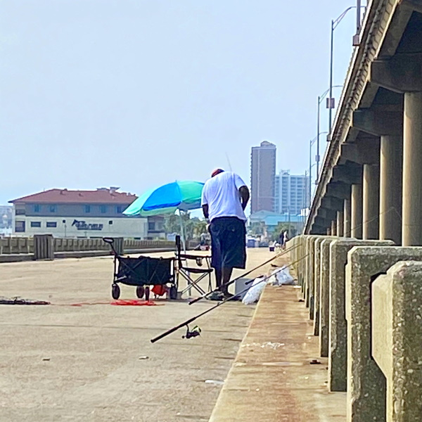 Fisherman on Bob Sikes fishing pier